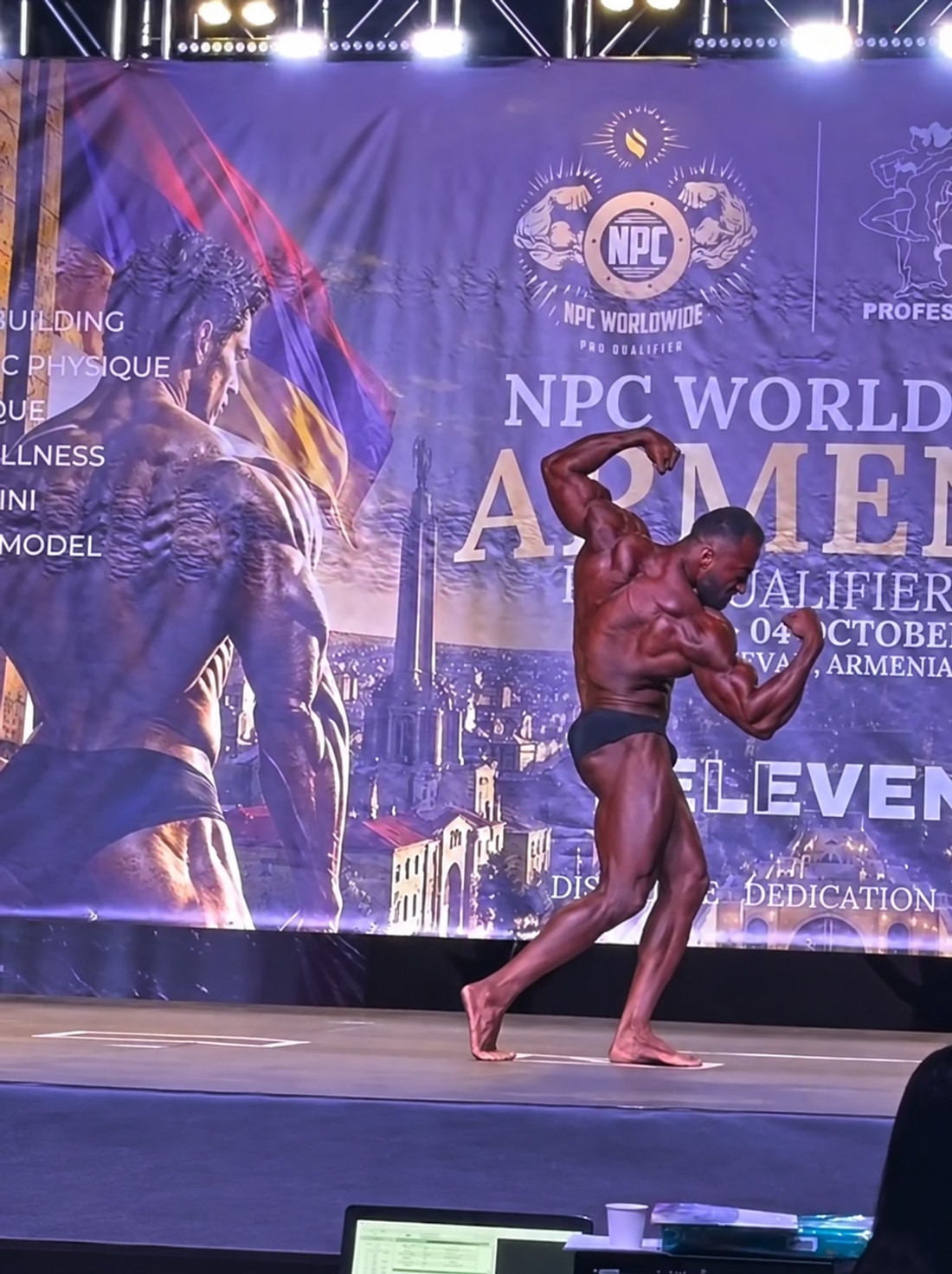 Team Maalouf athlete presenting his physique on stage in Yerevan