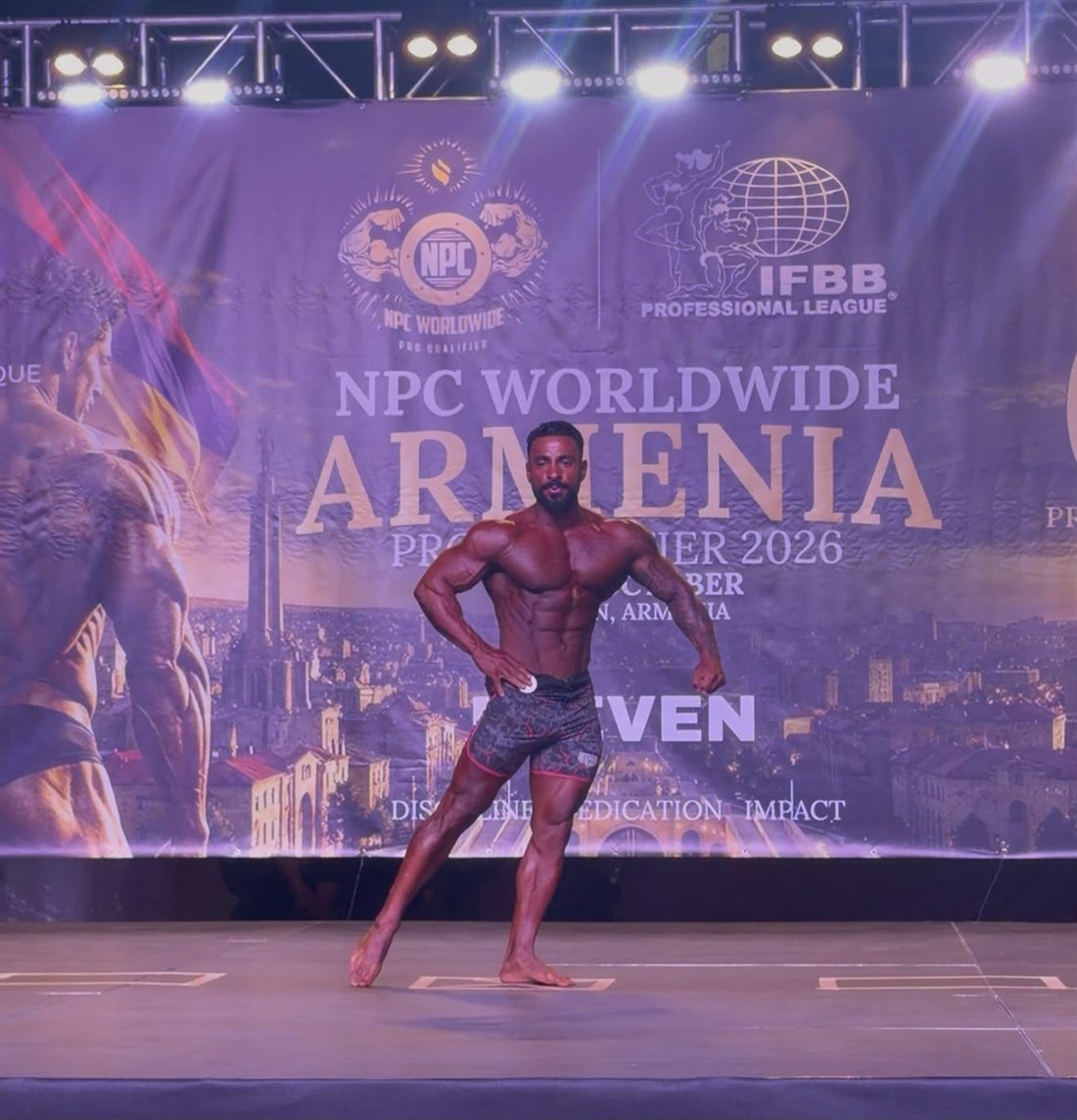 Team Maalouf athlete posing on stage in Yerevan